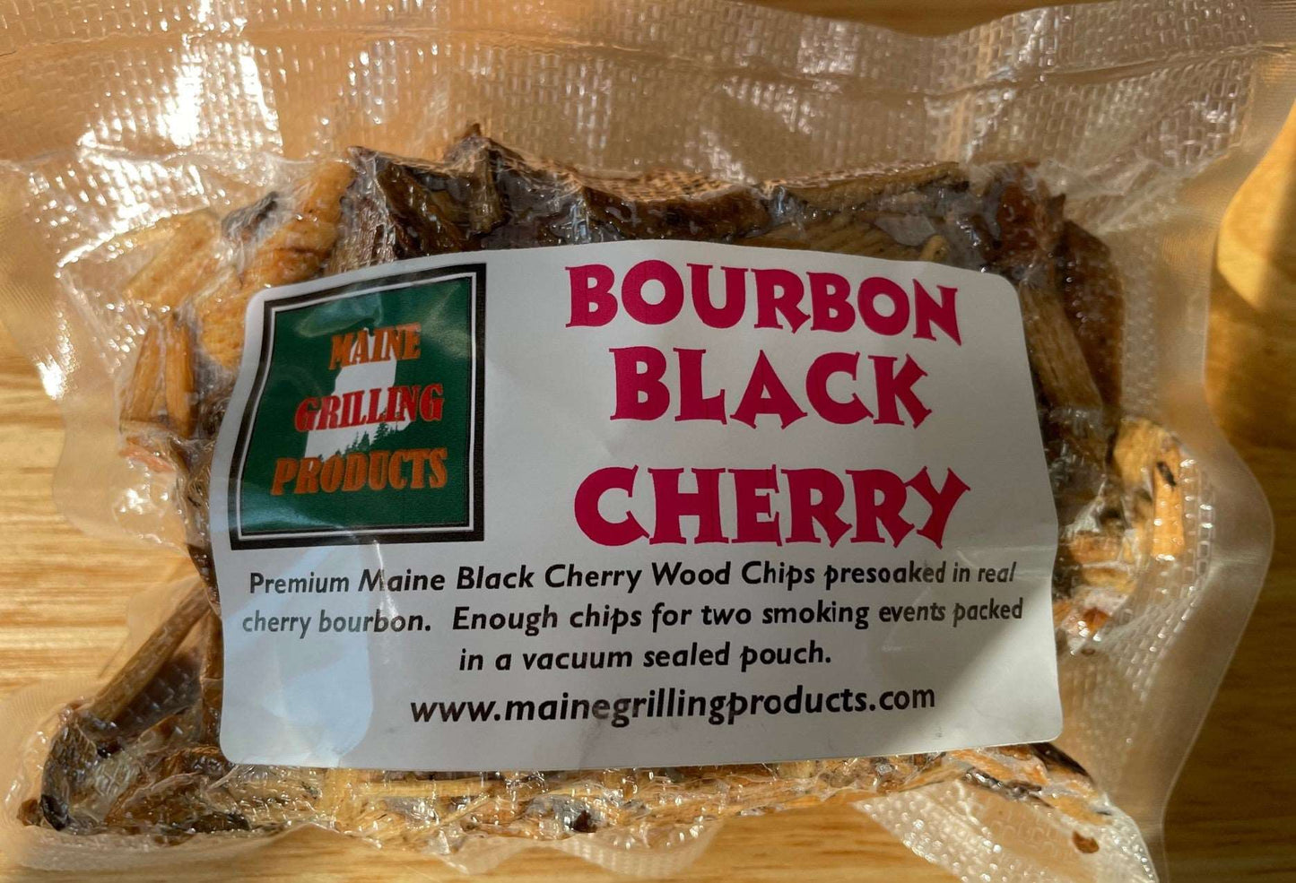 FOUR (6 OZ) POUCHES PRE-SOAKED MAINE BOURBON BLACK CHERRY WOOD CHIPS by Flame Grilling Products Inc