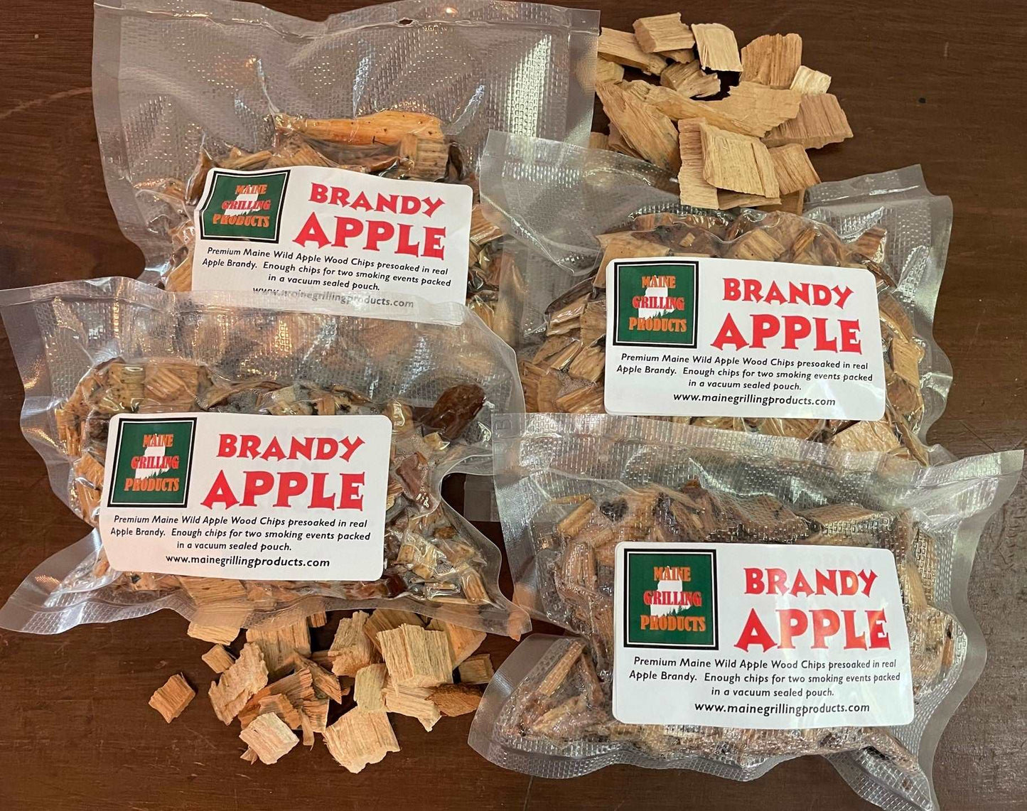 FOUR (6 OZ Pouches) PRE-SOAKED MAINE BRANDY APPLE WOOD CHIPS by Flame Grilling Products Inc